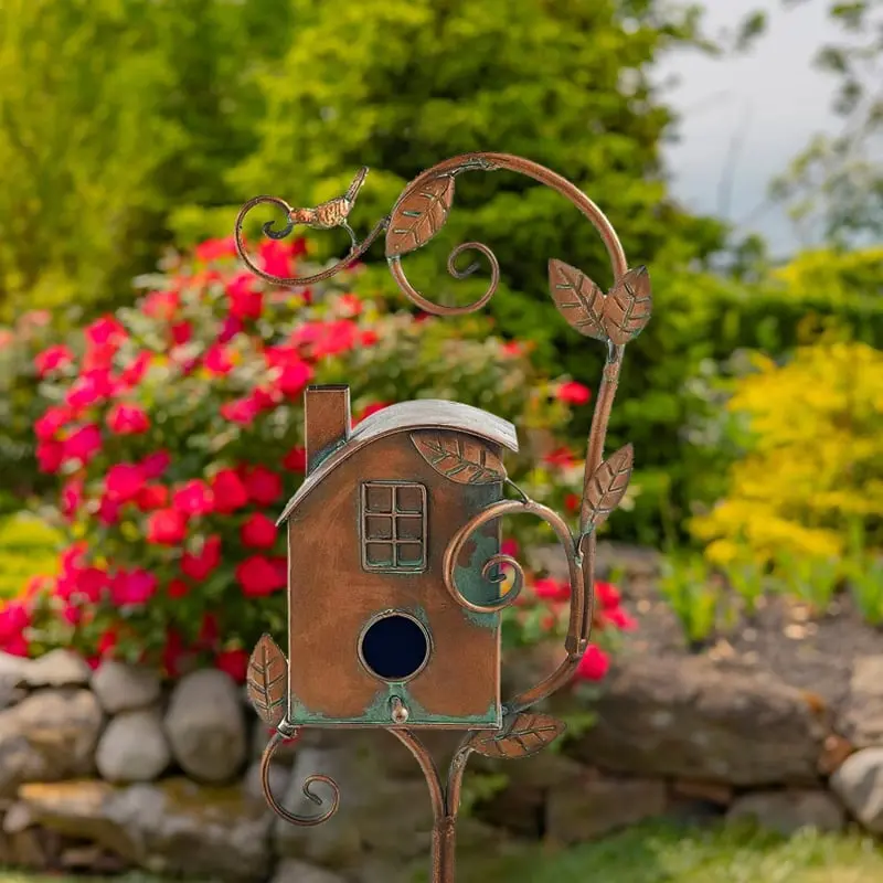 Close-up of birdhouse stake